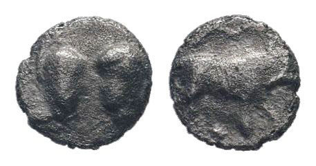 ASIA MINOR. Uncertain. 5th century BC.AR Obol.Confronted two acorns / Bull stand...