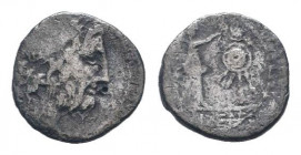 ANONYMOUS. 211-208 BC. AR Victoriatus . Uncertain mint in Sicily. Laureate head of Jupiter right / Victory standing right, crowning trophy. RSC 9.Fine...