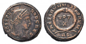 CRISPUS.316-326 AD.Rome mint.AE Follis.CRISPVS NOB CAES, Laureate head right / CAESARVM NOSTRORVM RS. VOT - X in two lines within wreath. RIC 240.Good...