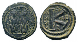 JUSTIN II and SOPHIA.565-578 AD.Antioch mint.AE Half Follis.Justin left and Sophia right, seated facing on double-throne, both nimbate, each holding a...
