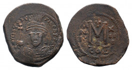 MAURICE TIBERIUS. 582-602 AD. Constantinople mint.AE Follis.DN mAVRIC TIBER PP AVI, crowned, cuirassed bust facing, holding cross on globe and shield ...