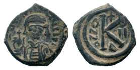 MAURICE TIBERIUS.582-602 AD.Antioch mint.AE Half Follis.DN MAV G I CN P AVG, crowned and mantled bust facing pattern on crown, holding mappa and eagle...