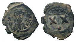 PHOCAS. 602-610 AD. Constantinople mint.AE Half Follis.AD. DN FOCA PERP AVG, crowned and mantled bust facing, holding mappa and cross / Large XX, star...