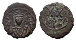 PHOCAS. 602-610 AD.Cyzicus mint. AE Half Follis. DN FOCA PERP AVG, crowned, mantled bust facing, holding mappa and cross / Large XX, cross above, regn...