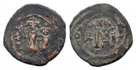 HERACLIUS and HERACLIUS CONSTANTINE.613-641 AD. Constantinople mint.AE Follis.Heraclius, bearded, on left, and Heraclius Constantine, on right, standi...