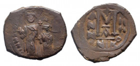 HERACLIUS and HERACLIUS CONSTANTINE.613-641 AD. Nicomedia mint.AE Follis. dd NN hERACLIVS ET hERA CON, Heraclius, on left and Heraclius Constantine on...