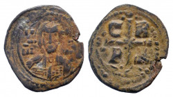 ROMANUS IV.1068-1071 AD.Constantinople mint.AE Follis. IC-XC NI-KA; facing bust of Christ, nimbate, holding book of Gospels / C-R P-Δ, Cross with glob...