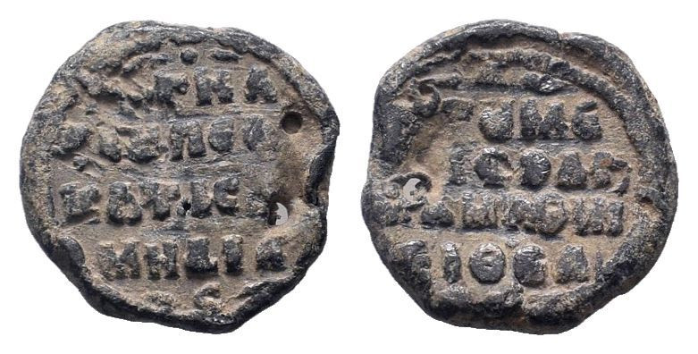 BYZANTINE LEAD SEAL.Circa 7 th - 12 th Century AD.PB Seal. Legend in four lines ...