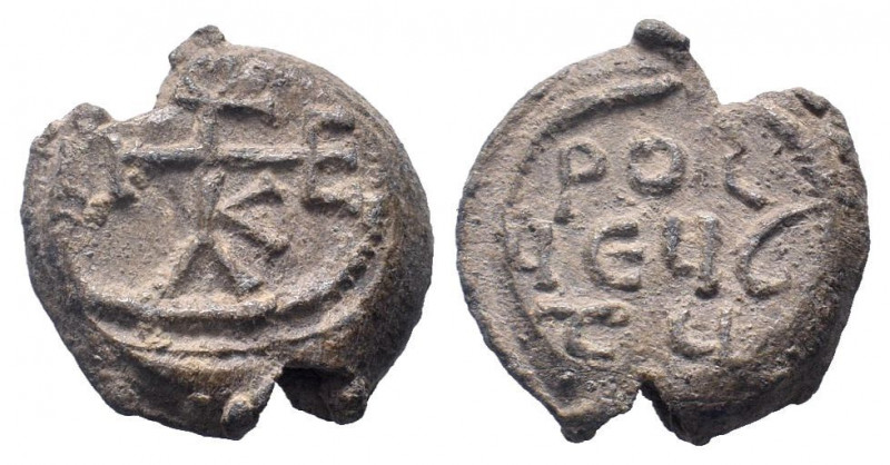 BYZANTINE LEAD SEAL.Circa 11 th Century AD.PB Seal.Cruciform monogram / Legend i...
