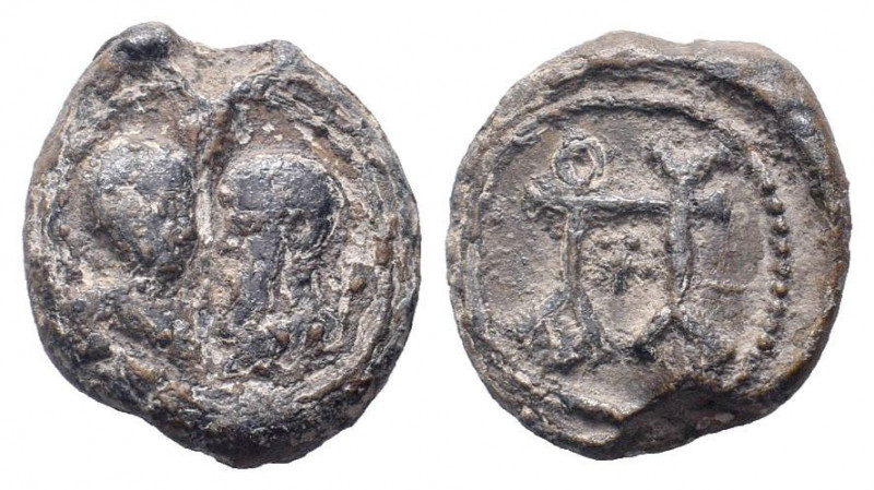 BYZANTINE LEAD SEAL.Circa 7 th - 12 th Century AD.PB Seal.Confronted bust of sai...