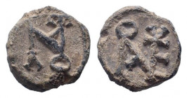BYZANTINE LEAD SEAL.Circa 7 th - 12 th Century AD.PB Seal.Cruciform monogram / Cruciform monogram.Good fine.

Weight : 4.8 gr

Diameter : 16 mm