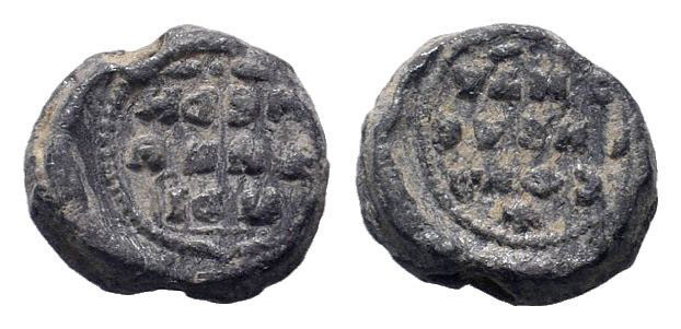 BYZANTINE LEAD SEAL.Circa 7 th - 12 th Century AD.PB Seal.Legend in three lines ...