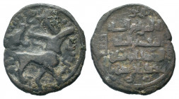 ARTUQID of MARDIN.Nasir ad din Artuq Arslan.1200-1239 AD.Mardin mint.606 AH.AE Dirham. Centaur advancing right, head facing, drawing bow at head of dr...