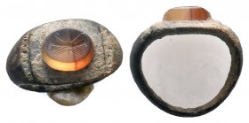 Byzantine.Circa 7th-13th century AD. Nice bronze ring with a seal stone on bezel

Weight : 5.5 gr

Diameter : 21 mm