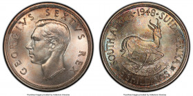 George VI Prooflike 5 Shillings 1948 PL68 PCGS, KM40.1. Full cartwheel luster with peach and aqua toning. 

HID09801242017

© 2020 Heritage Auctio...