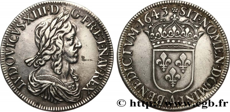 LOUIS XIII
Type : Écu d'argent, 3e type, 2e poinçon de Warin 
Date : 1643 
Mint ...