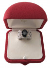 Anello zaffiro e diamanti Fascia traforata in oro bianco 750/1000 con zaffiro taglio ovale ct. 3,23 contornata da diamanti taglio brillante ct 0,87. C...