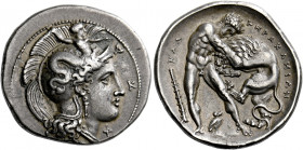 Lucania, Heraclea.   Nomos circa 390-340, AR 7.84 g. Head of Athena r., wearing Attic helmet decorated with Scylla hurling stone; in r. field, Δ - Κ -...