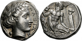 Naxos.   Didrachm circa 415-403, AR 8.45 g. NAΞIΩN Laureate head of Apollo r.; behind, laurel leaf with berry. Rev. Naked Silenus squatting, holding c...