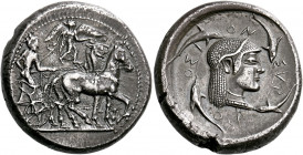 Syracuse.   Tetradrachm, work of the Master of the Large Arethusa head circa 485-480, AR 17.00 g. Slow quadriga driven r. by charioteer, holding kentr...