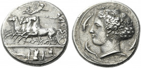 Syracuse.   Decadrachm signed by Kimon circa 405-400, AR 42.70 g. Fast quadriga driven l. by charioteer, holding reins and kentron; in field above, Ni...