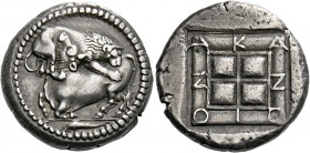 Acanthus.   Tetradrachm circa 424-380, AR 14.28 g. Lion r., attacking bull kneeling to l. biting into its hind quarters; in exergue, dolphin l. Rev. A...