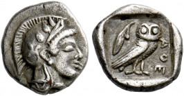 Attica, Athens.   Obol circa 450, AR 0.68 g. Head of Athena r., wearing crested Attic helmet with three olive leaves over visor and spiral palmette on...