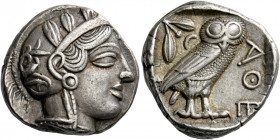 Attica, Athens.   Tetradrachm circa 435-420, AR 17.16 g. Head of Athena r., wearing crested Attic helmet and disc earring; bowl ornamented with spiral...
