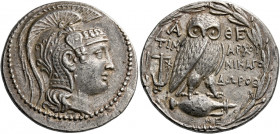 Attica, Athens.   Tetradrachm circa 134-133, AR 15.82 g. Head of Athena r., wearing crested Attic helmet, bowl decorated with tendril, griffin and the...