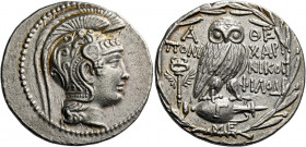 Attica, Athens.   Tetradrachm circa 133-132, AR 16.83 g. Head of Athena r., wearing crested Attic helmet, bowl decorated with tendril, griffin and the...