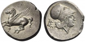 Corinthia, Corinth.   Stater circa 375-300, AR 8.59 g. Pegasus flying l., beneath [koppa]. Rev. Head of Athena r., wearing Corinthian helmet; behind, ...
