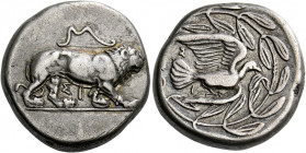 Sycionia, Sycion.   Stater circa 431-400, AR 11.90 g. Lion advancing r.; above, bow and, beneath, ΣΙ. Rev. Dove flying r.; above and below its tail, Σ...