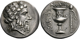 Naxos.   Didrachm circa 200-180 BC, AR 7.78 g. Head of bearded Dionysus r., wearing ivy wreath. Rev. ΝΑΞΙ / ΚΡΗΘΕ Wreathed kantharos on a high foot wi...