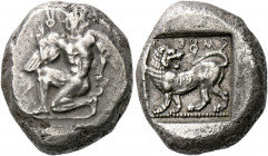 Uncertain mint in Caria.   Stater, mint B circa 480-460, AR 11.81g. Young naked winged male figure, with winged heels, in kneeling-running position l....