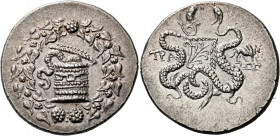 Lydia, Tralleis.   Cistophoric tetradrachm circa 155-145, AR 12.65 g. Snake emerging from cista mistica; all within ivy wreath. Rev. Two serpents entw...