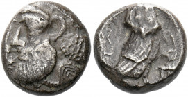Philistia, Gaza.   Quarter shekel or drachm, circa 450–400, AR 3.35 g. Bearded and diademed (?) male head l.; behind, oriental headdress with bunched ...