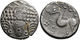 Celtic Coins. Central Europe, East Noricum.   Tetradrachm "Frontalgesicht" type, Slovenia 2nd-1st cent. BC, AR 7.86 g. Small head facing, wings at sid...
