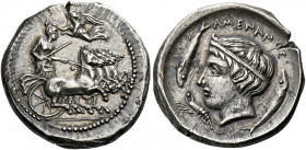 Sicily, Catana.   Drachm in the style of Procles circa 405, AR 4.20 g. Fast quadriga driven r. by charioteer, holding kentron and reins; above, Nike f...