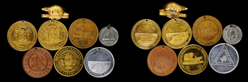 Late 19th and 20th Century Tokens

Wisconsin. Lot of (7) Late 19th Century Tok...