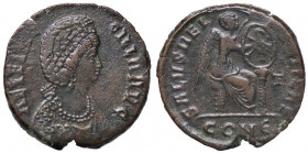 ROMANE IMPERIALI - Aelia Flaccilla (moglie di Teodosio) - AE 2 - Testa diademata a d. /R La Vittoria seduta a d. scrive su uno scudo, nel campo letter...