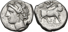 Greek Italy. Central and Southern Campania, Neapolis. AR Didrachm, c. 275-250 BC. Obv. Head of female left; uncertain symbol (owl ?) behind. Rev. Man-...