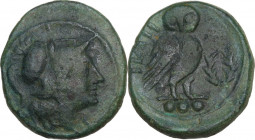 Greek Italy. Northern Apulia, Teate. AE Teruncius, c. 225-200 BC. Obv. Helmeted head of Athena right. Rev. TIATI. Owl standing right, head facing, on ...