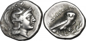 Greek Italy. Southern Apulia, Tarentum. AR Drachm, c. 272-240 BC. Obv. Head of Athena right, wearing Attic helmet, decorated with Scylla hurling stone...