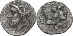 Greek Asia. Cilicia, uncertain mint. AR Obol, 4th century BC. Obv. Laureate head of Zeus left, traces of legend around. Rev. Head of Herakles right, w...