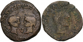 Tiberius (14-37) with Julia Augusta (Livia) and Drusus. Ae As, Tarraco mint, Spain. Struck c. 22-23 AD. Obv. TI CAES AVG PONT MAX TRIB POT. Laureate h...