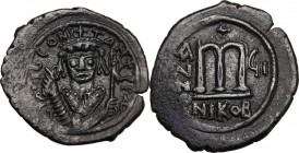 Tiberius II Constantine (578-582). AE Follis, Nicomedia mint. Obv. DN TIb CONs-TANT PP AY. Facing bust, wearing consular robes, mappa and eagle-tipped...