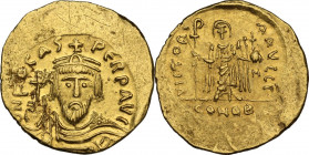 Phocas (602-610). AV Solidus, Constantinople mint, c. 607-609 AD. Obv. d N FOCAS PЄRP AVG Crowned, draped and cuirassed bust facing, holding globus cr...
