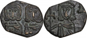 Constantine V Copronymus with Leo IV (751-775). AE Follis. Syracuse mint, 751-775. Obv. Crowned half-length facing busts of Constantine V, bearded, an...