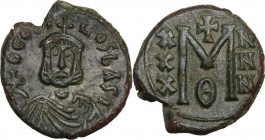 Theophilus (829-842). AE Follis, Syracuse mint. Obv. ΘEO[FI]-LOS bASI. Bust facing, wearing crown and chlamys, and holding globus cruciger. Rev. Large...