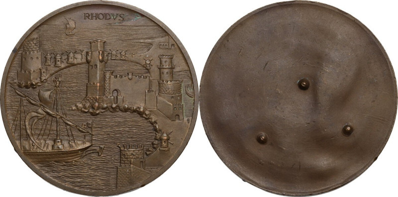 Medaglia unifacie o prova di medaglia, con la raffigurazione del porto di Rodi. ...